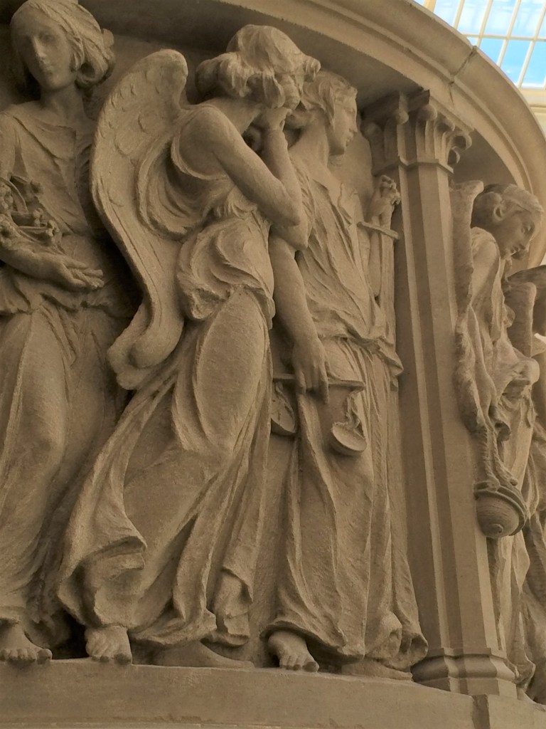 Angels sculpted by Karl Bitter on a pulpit used in All Angels Church